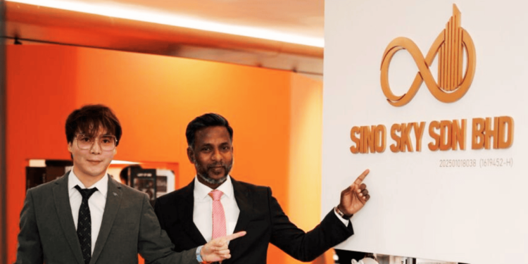 Datuk Harridzs Mohan with guests at the Sino Sky office launch ceremony.