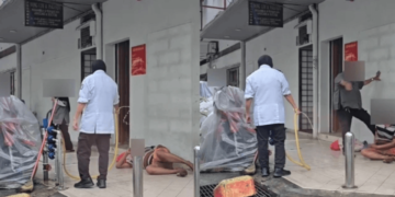 AmBank deeply concerned after viral video shows homeless man sprayed and kicked outside branch